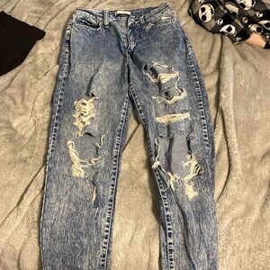 Dark blue ripped flare jeans
